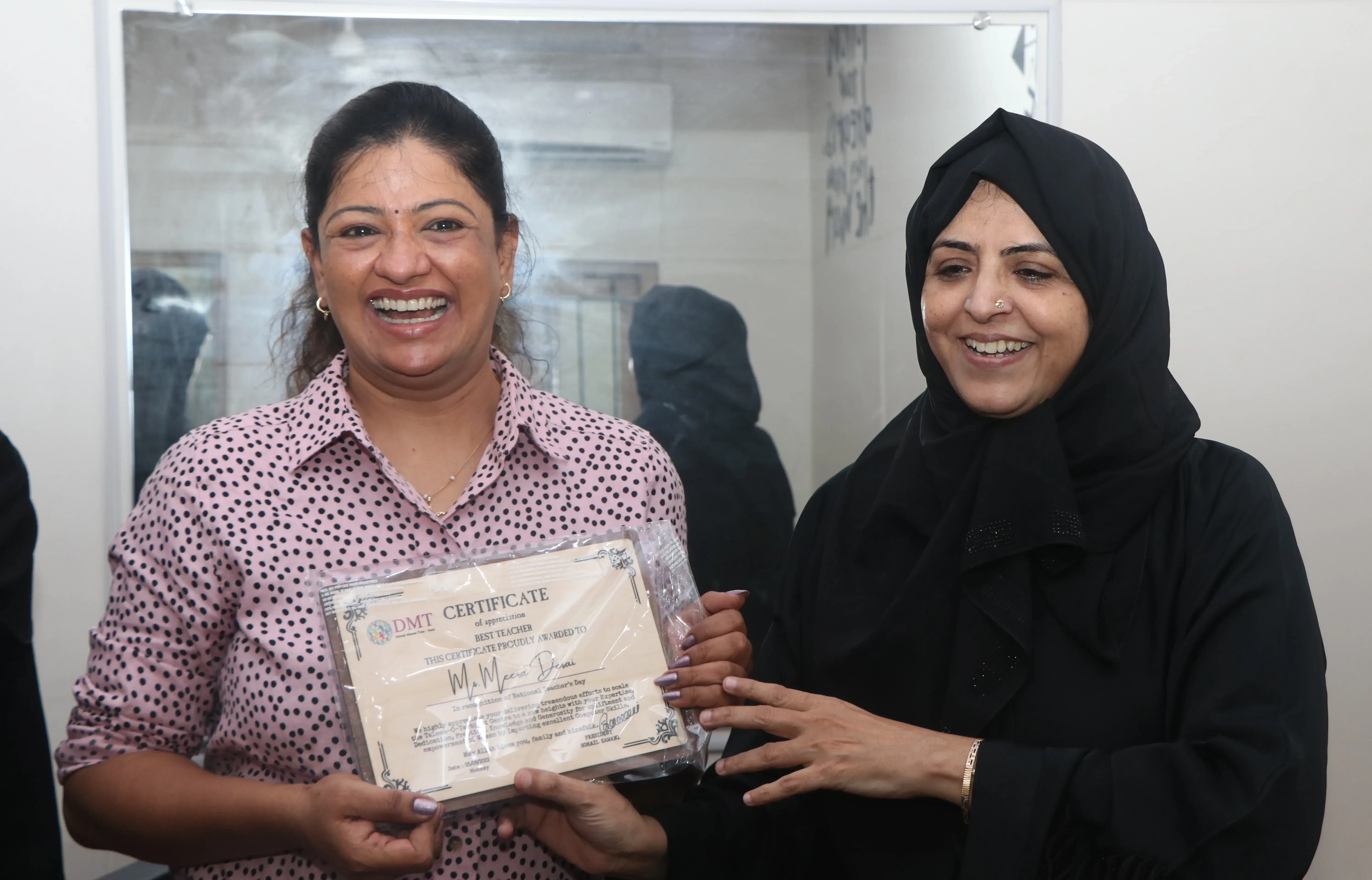 photo of the founder getting honoured by the DMJ Muslim Trust