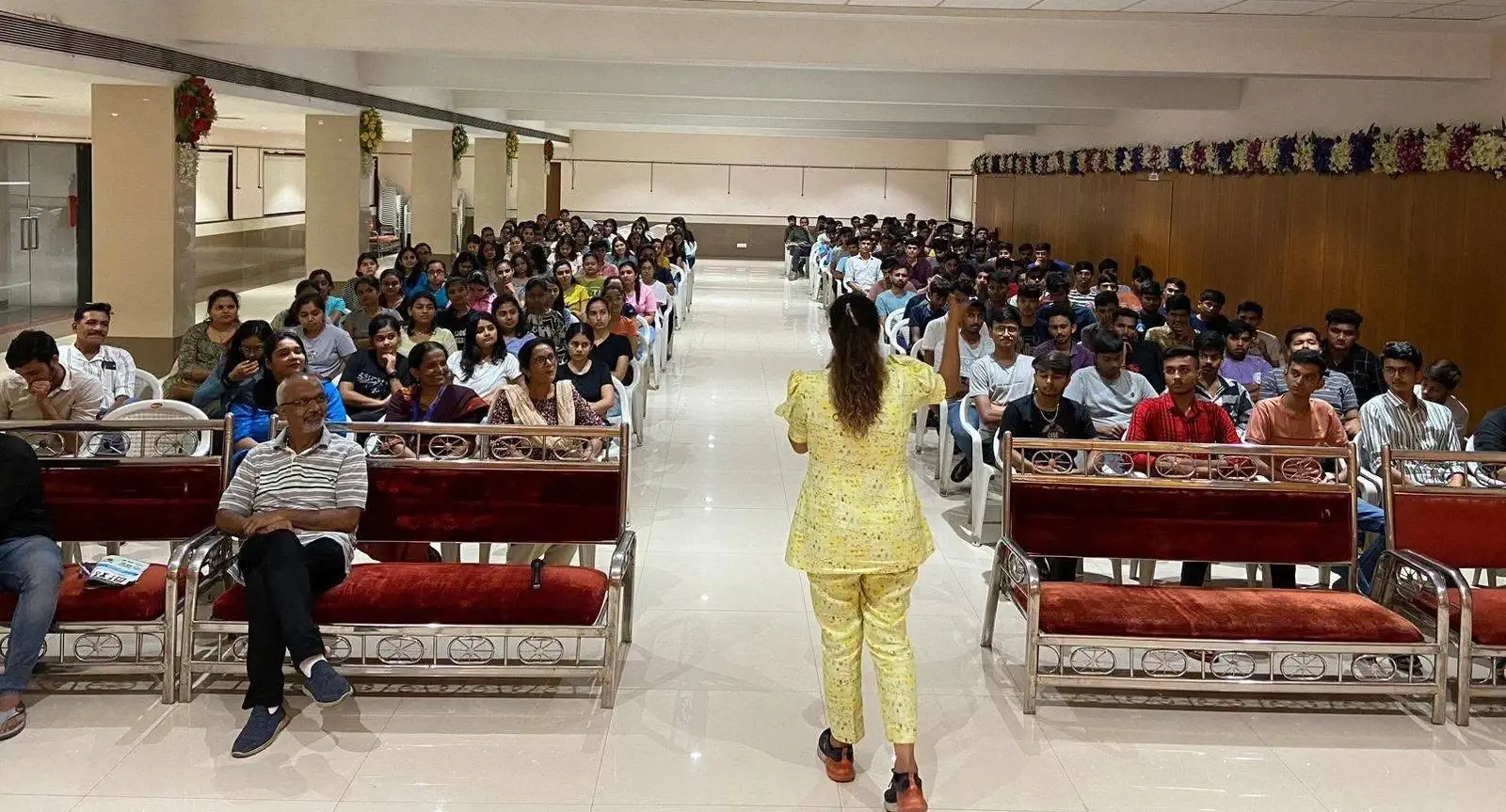 photo of the founder taking seminar for 250+ students